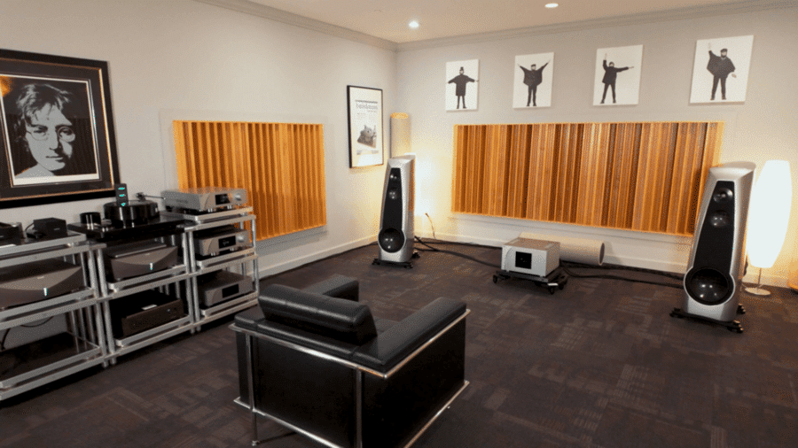 An image of HiFi Buys’ updated showroom featuring floor-standing speakers, acoustical treatments, and Beatles memorabilia.